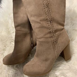 Above the knee heeled boots